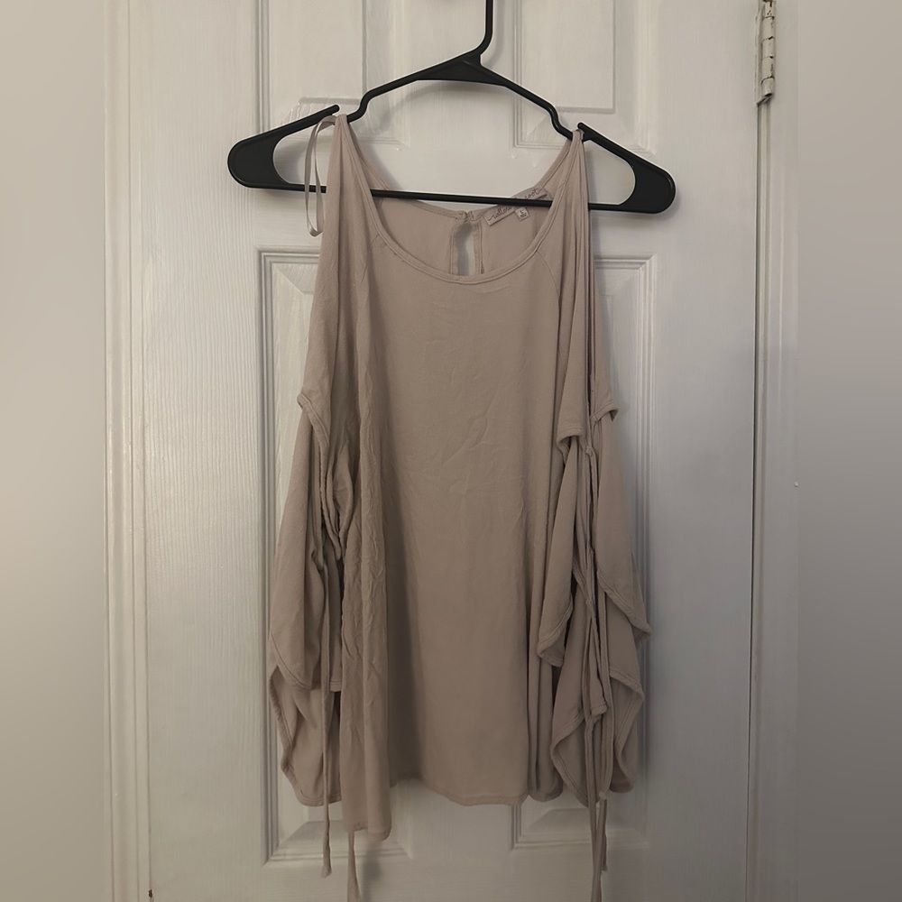 Women’s beige buckle shirt